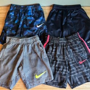 Four pairs of boys Nike athletic shorts, good used condition.